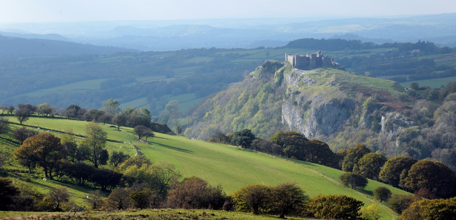 Carreg Cennen Castle on its limestone crag in the Carmarthenshire landscape