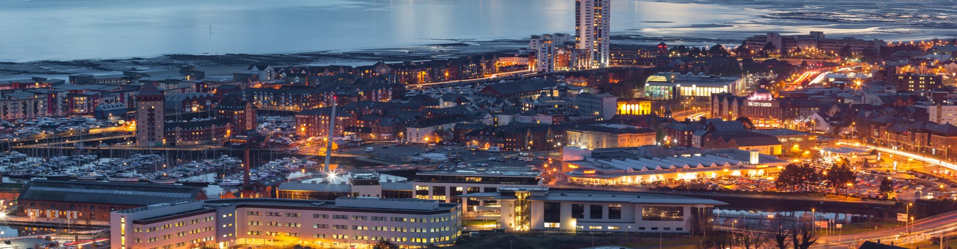 Swansea city centre, the marina and Swansea Bay at dusk